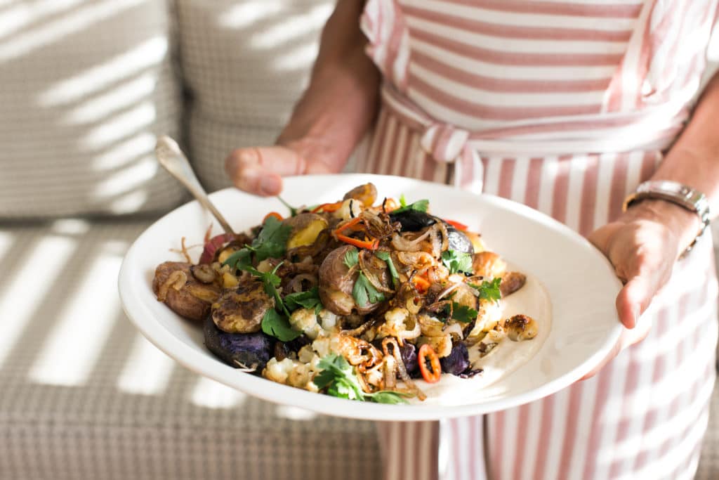 Smashed Roasted Potatoes with Crispy Cauliflower, Tahini and Chiles // www.LisaSamuel.com