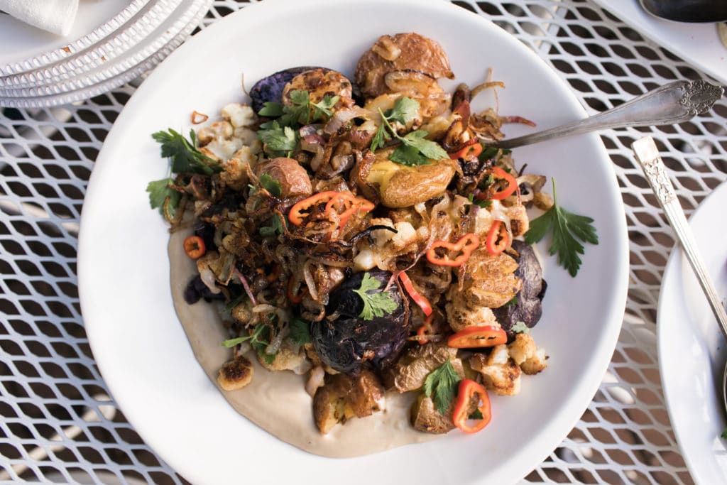 Smashed Roasted Potatoes with Crispy Cauliflower, Tahini and Chiles // www.LisaSamuel.com